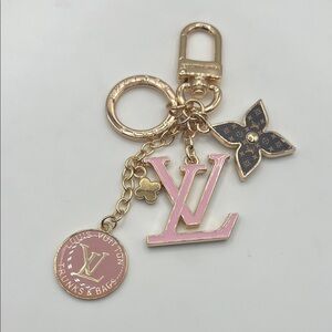 1196. LV Pink and Gold Keychain
